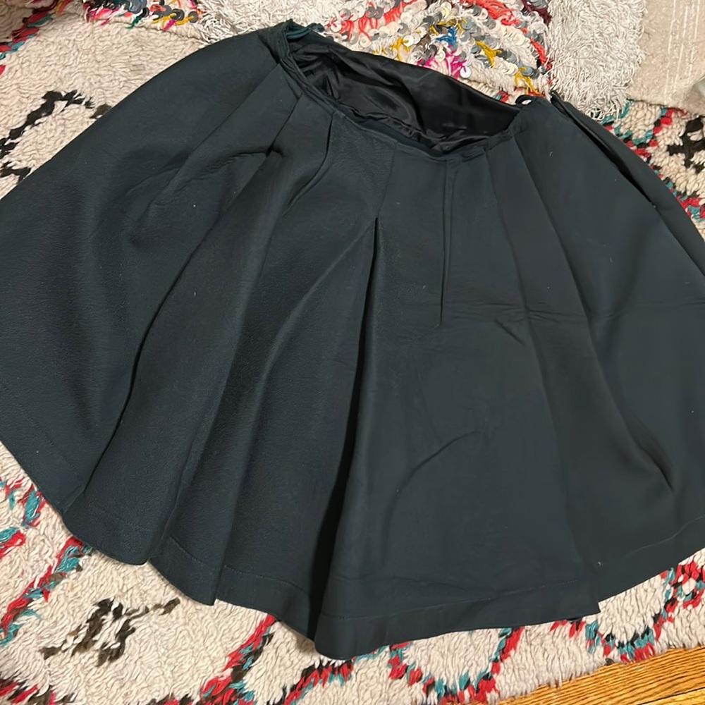 Dice Kaye’s pleated mini skirt y2k
